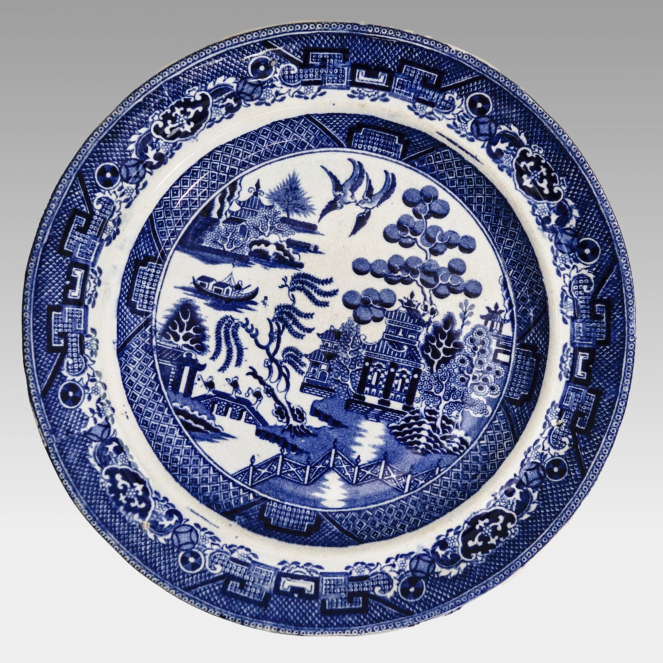 309 - Teller mit blau-weißer Landschaftsdekoration (Willow Pattern)